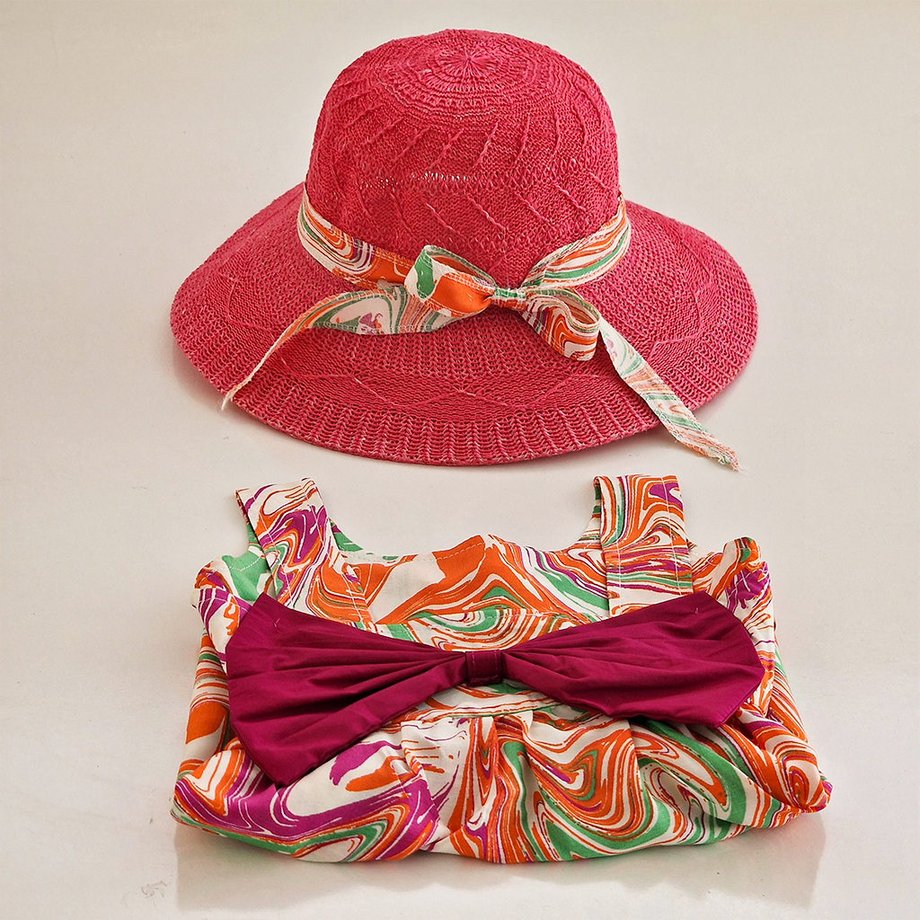 Girls' colorful summer dress with a stylish hat and a bow tie
