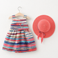 Girls' colorful summer dress with a stylish hat and a large bow tie