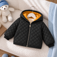 Veste matelassée à capuche pour enfant – Confort et chaleur pour les aventures du quotidien