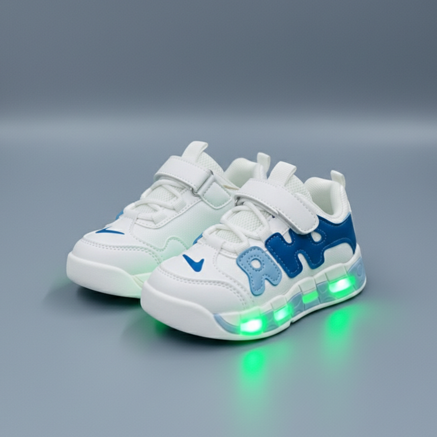 Kids LED light-up sneakers in four color options& with breathable mesh panels, hook-and-loop straps, and transparent soles that glow while walking.
