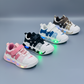 Kids LED light-up sneakers in four color options& with breathable mesh panels, hook-and-loop straps, and transparent soles that glow while walking.