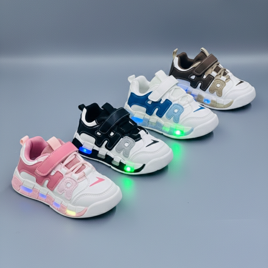 Kids LED light-up sneakers in four color options& with breathable mesh panels, hook-and-loop straps, and transparent soles that glow while walking.