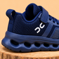 Baskets sport en mesh pour enfant avec bride réglable, détail à lacets et semelle sculptée – Chaussures décontractées pour tous les jours en noir, gris et bleu marine