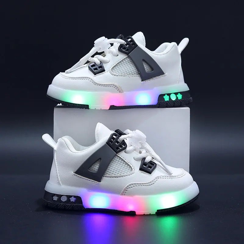 Modern sports shoes for children with LED lighting. Comfortable and non-slip.