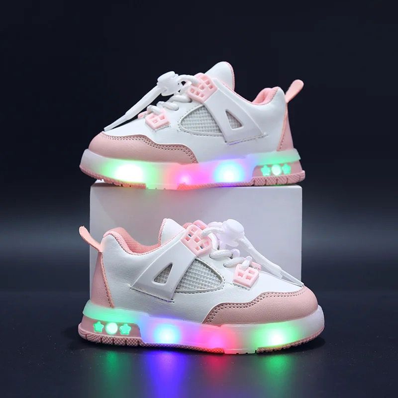 Modern sports shoes for children with LED lighting. Comfortable and non-slip.