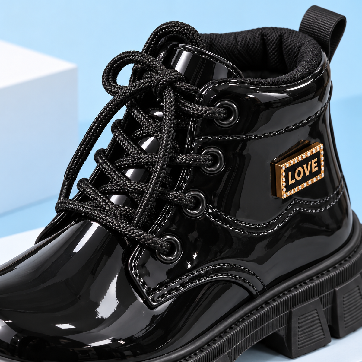 Girls’ Glossy Lace-Up Ankle Boots with Chunky Treaded Soles, Padded Collars and Elegant Gold-Tone “LOVE” Details for Stylish Everyday Outfits